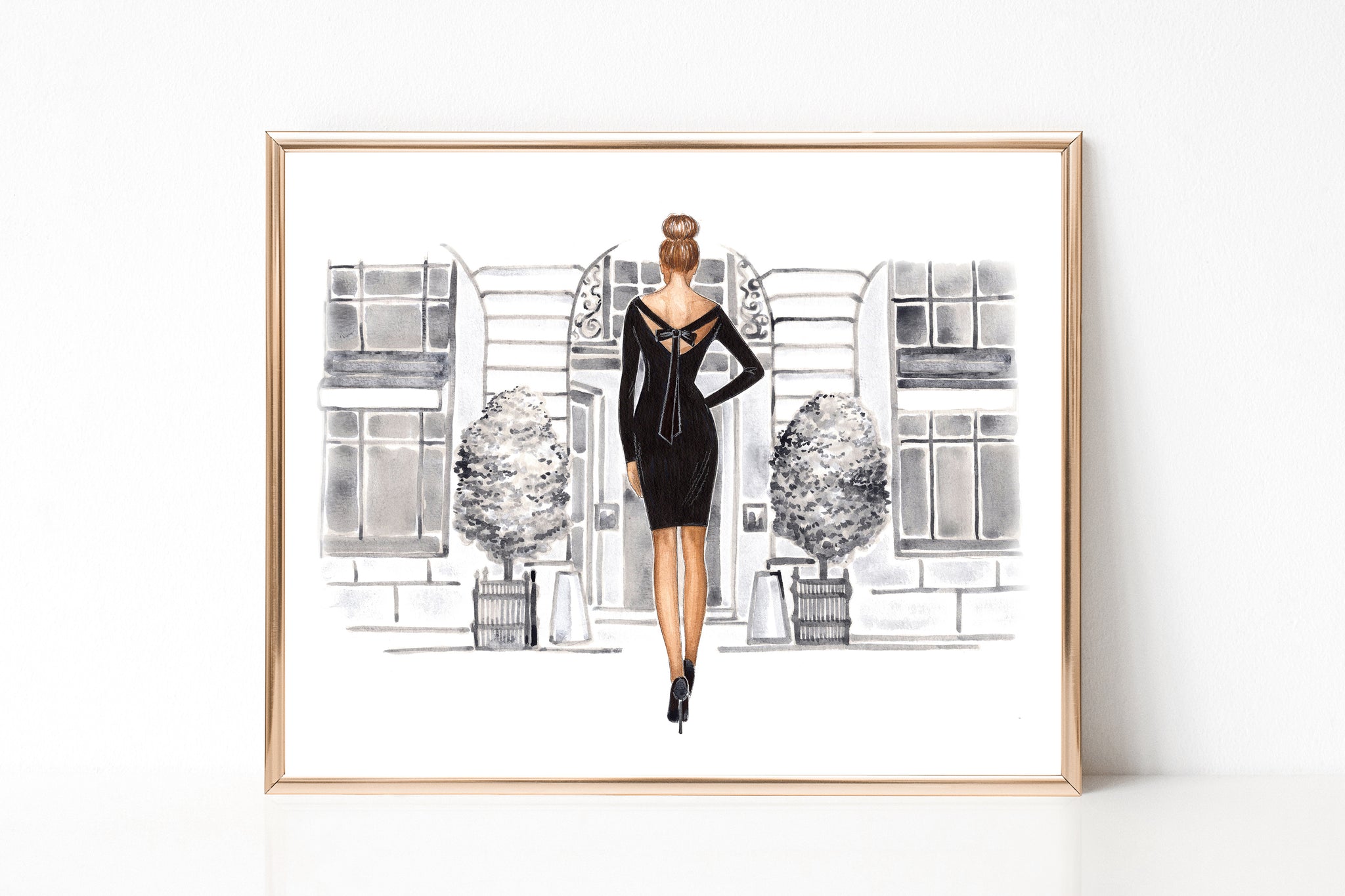 Black and white watercolor Fashion Wall Art of lady in black dress in front of the shop vitrine