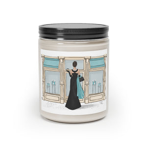 Scented Glass Jar Candle, 9oz with Audrey in front of the shop label. Vanilla or cinnamon stick scented candle